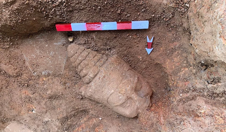 Archaeologists find missing head of Deva from the Victory Gate of Angkor Thom