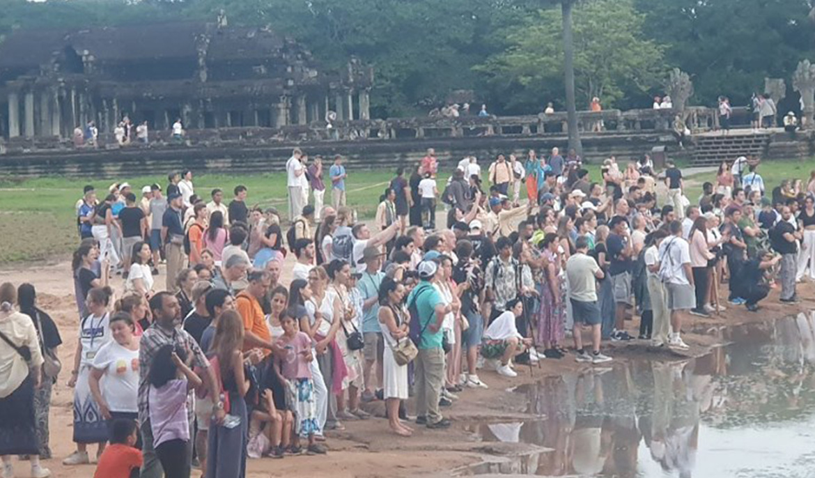 National and international tourists flock to witness the breath-taking sunrise at Angkor Wat